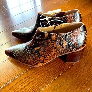 franco sarto snakeskin booties.